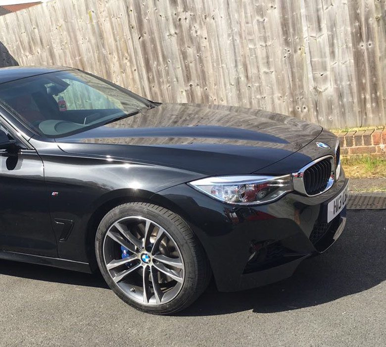 Black BMW prepared for return at the end of a lease contract